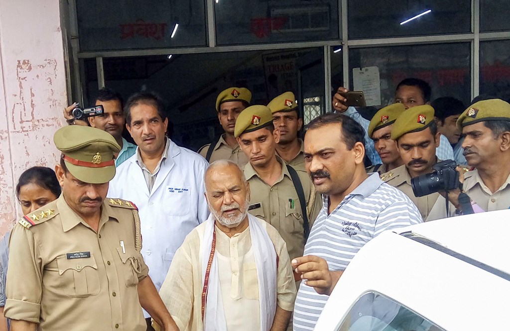 Shahjahanpur: Former Union minister Swami Chinmayanand, accused of rape by a law student, is seen outside a government hospital after a medical examination following his arrest by a special team of Uttar Pradesh police, in Shahjahanpur, Friday, Sept. 20, 2019. (PTI Photo) (PTI9_20_2019_000010B)