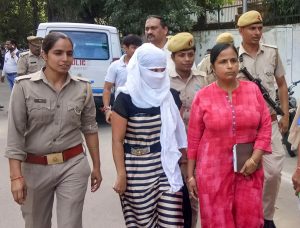 Shahjahanpur: The woman law student, who alleged BJP leader Chinmayanand of sexual misconduct and harassment, outside a local court in Shahjahanpur, Tuesday, Sept. 24, 2019. The court Tuesday admitted the anticipatory bail plea of her after she was booked for allegedly trying to extort money from him. (PTI Photo) (PTI9_24_2019_000129B)