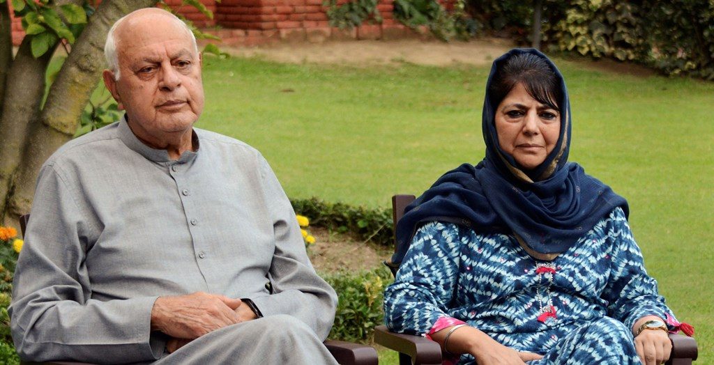 **EDS: FILE PHOTO** Srinagar: In this file photo dated Aug. 4, 2019, are National Conference President Farooq Abdullah and PDP President Mehbooba Mufti during an all party meeting, in Srinagar. The Supreme Court on Monday, Sept. 16, 2019, has sought response from the Centre and the Jammu and Kashmir administration on a plea seeking to produce before court Abdullah, who is allegedly under detention following the scrapping of the state's special status. (PTI Photo) (PTI9_16_2019_000042B)