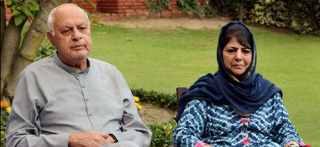 **EDS: FILE PHOTO** Srinagar: In this file photo dated Aug. 4, 2019, are National Conference President Farooq Abdullah and PDP President Mehbooba Mufti during an all party meeting, in Srinagar. The Supreme Court on Monday, Sept. 16, 2019, has sought response from the Centre and the Jammu and Kashmir administration on a plea seeking to produce before court Abdullah, who is allegedly under detention following the scrapping of the state's special status. (PTI Photo) (PTI9_16_2019_000042B)