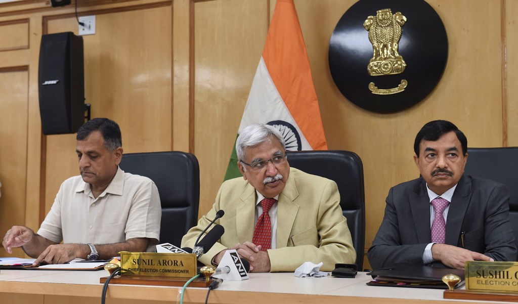 New Delhi: Chief Election Commissioner Sunil Arora flanked by Election Commissioners Ashok Lavasa (L) and Sunil Chandra during a press conference regarding Maharashtra and Haryana Assembly Elections, at Election Commission in New Delhi, Saturday, Sept. 21, 2019. (PTI Photo/Shahbaz Khan) (PTI9_21_2019_000021B)