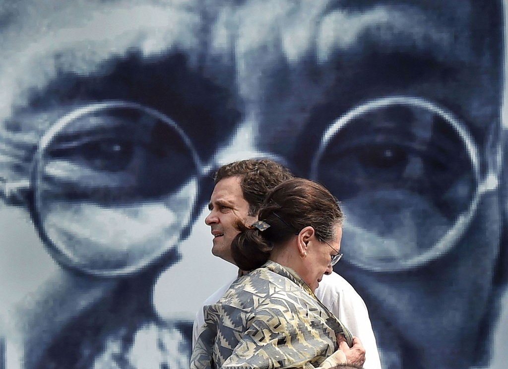 New Delhi: Congress President Sonia Gandhi with party leader Rahul Gandhi at Rajghat to commemorate the 150th birth anniversary of Mahatma Gandhi after party's Gandhi Sandesh ‘Pad Yatra’ from DPCC to Rajghat, in New Delhi, Wednesday, Oct. 2, 2019. (PTI Photo/Manvender Vashist) (PTI10_2_2019_000262A)(PTI10_2_2019_000319B)