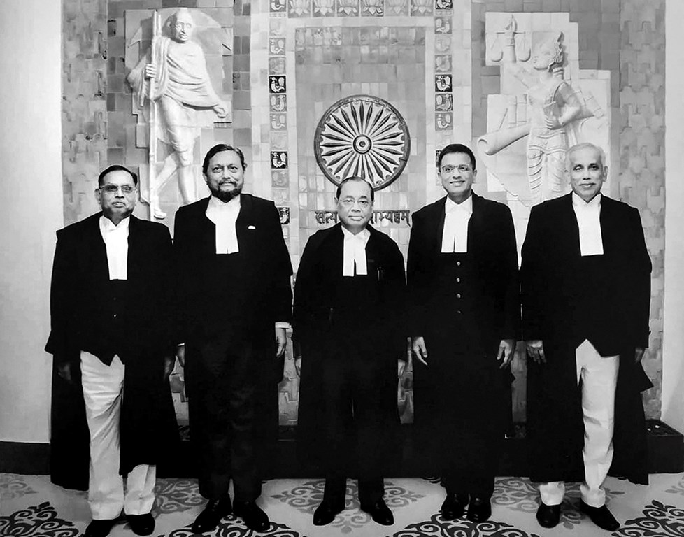 New Delhi: A group photo of the five-judge bench comprised of Chief Justice of India Ranjan Gogoi (C) flanked by (L-R) Justice Ashok Bhushan, Justice Sharad Arvind Bobde, Justice Dhananjaya Y Chandrachud, Justice S Abdul Nazeer after delivering the verdict on Ayodhya land case, at Supreme Court in New Delhi, Saturday, Nov. 9, 2019. (PTI Photo) (PTI11_9_2019_000298B)