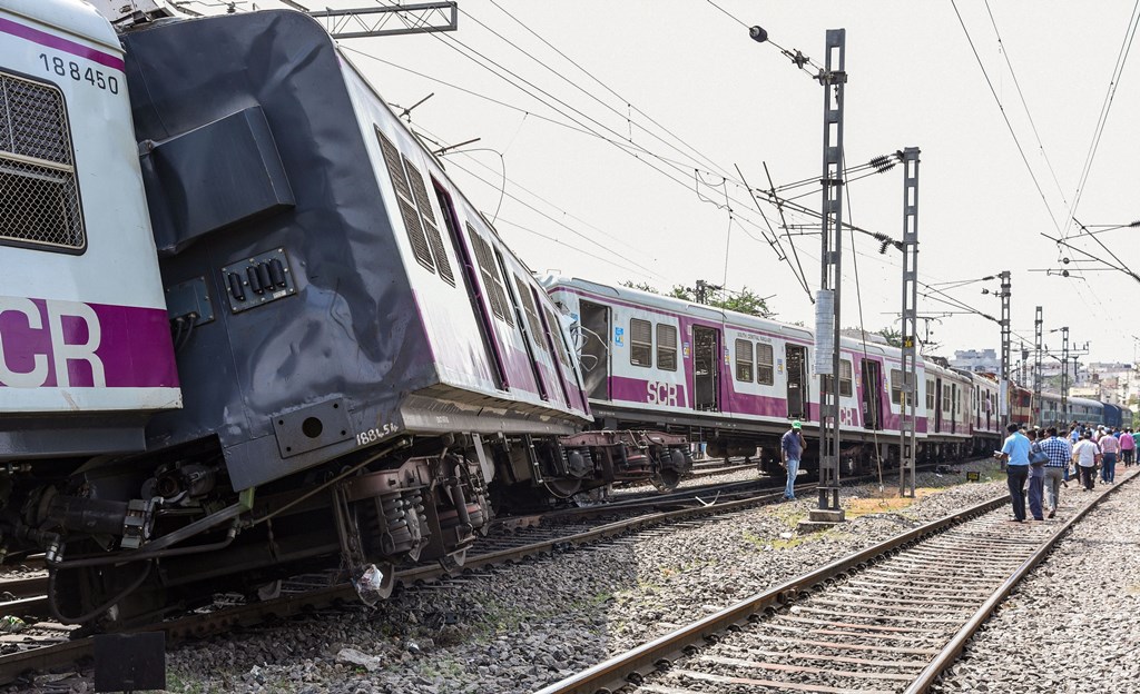 Hyderabad: Onlookers gather at the accident site where a Multi-Modal Transport System (MMTS) train collided with a passenger train between Kacheguda and Malakpet stations, in Hyderabad, Monday, Nov. 11, 2019. (PTI Photo) (PTI11_11_2019_000029B)