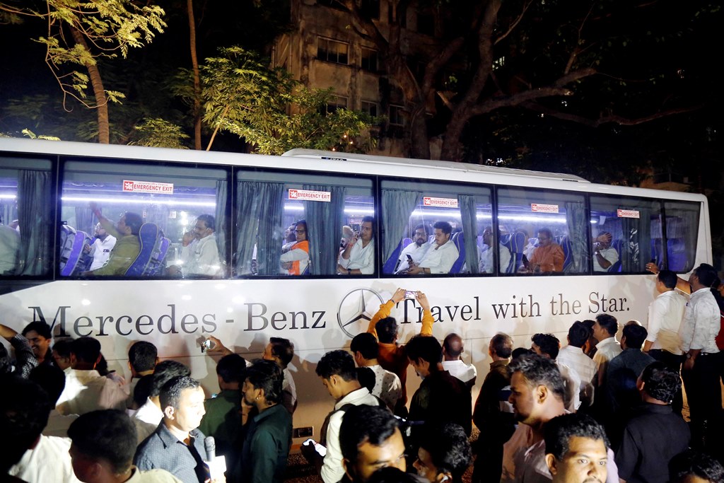 Mumbai: NCP MLAs leave in a bus after a meeting with party MLA's in Mumbai, Saturday, Nov. 23, 2019. At least nine NCP MLAs who attended swearing-in of Ajit Pawar as deputy chief minister of Maharashtra returned to the party fold and expressed solidarity with party chief Sharad Pawar. (PTI Photo)(PTI11_23_2019_000284B)