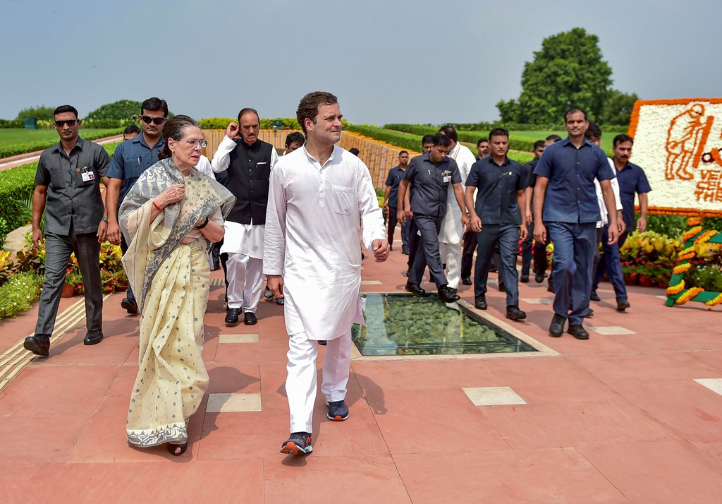 **EDS: FILE PHOTO** New Delhi: In this Oct. 2, 2019 file photo, Congress President Sonia Gandhi with party leader Rahul Gandhi accompanied by SPG leave after paying tribute to Mahatma Gandhi on the 150th birth anniversary at Rajghat in New Delhi. The government has withdrawn the Special Protection Group (SPG) cover of Congress president Sonia Gandhi and her children Rahul and Priyanka, and they will now be given Z-plus security by the CRPF on Friday, Nov. 8, 2019. (PTI Photo/Manvender Vashist)(PTI11_8_2019_000130B)