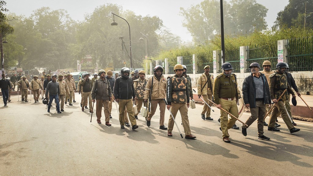 Lucknow: Police personnel deployed outside the historic Tiley Wali Masjid ahead of Friday prayers in view of protests against CAA and NRC, in Lucknow, Friday, Dec. 27, 2019. (PTI Photo/Nand Kumar)(PTI12_27_2019_000100B)