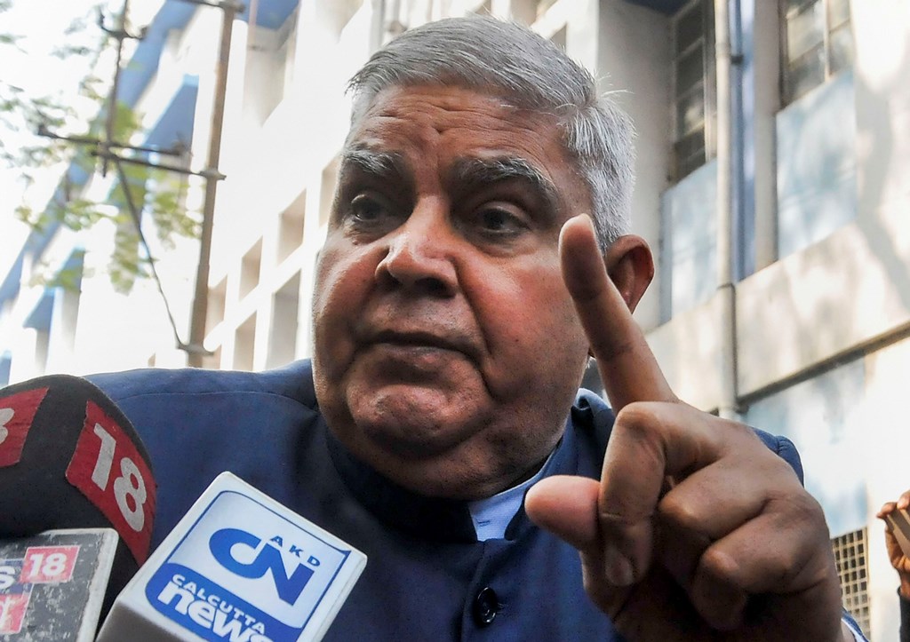 Kolkata: West Bengal Governor Jagdeep Dhankhar gestures as he speaks to the media persons after his motorcade was stopped by protesters at a gate of Jadavpur University, as he arrived to attend its annual convocation, in Kolkata, Tuesday, Dec. 24, 2019. (PTI Photo)(PTI12_24_2019_000079B)