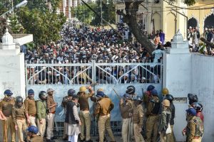 Lucknow: Police force outside Darul Uloom Nadwatul Ulama college as students protest against the amended Citizenship Act and indulged in stone pelting, in Lucknow, Monday, Dec. 16, 2019. (PTI Photo/Nand Kumar) (PTI12_16_2019_000060B)