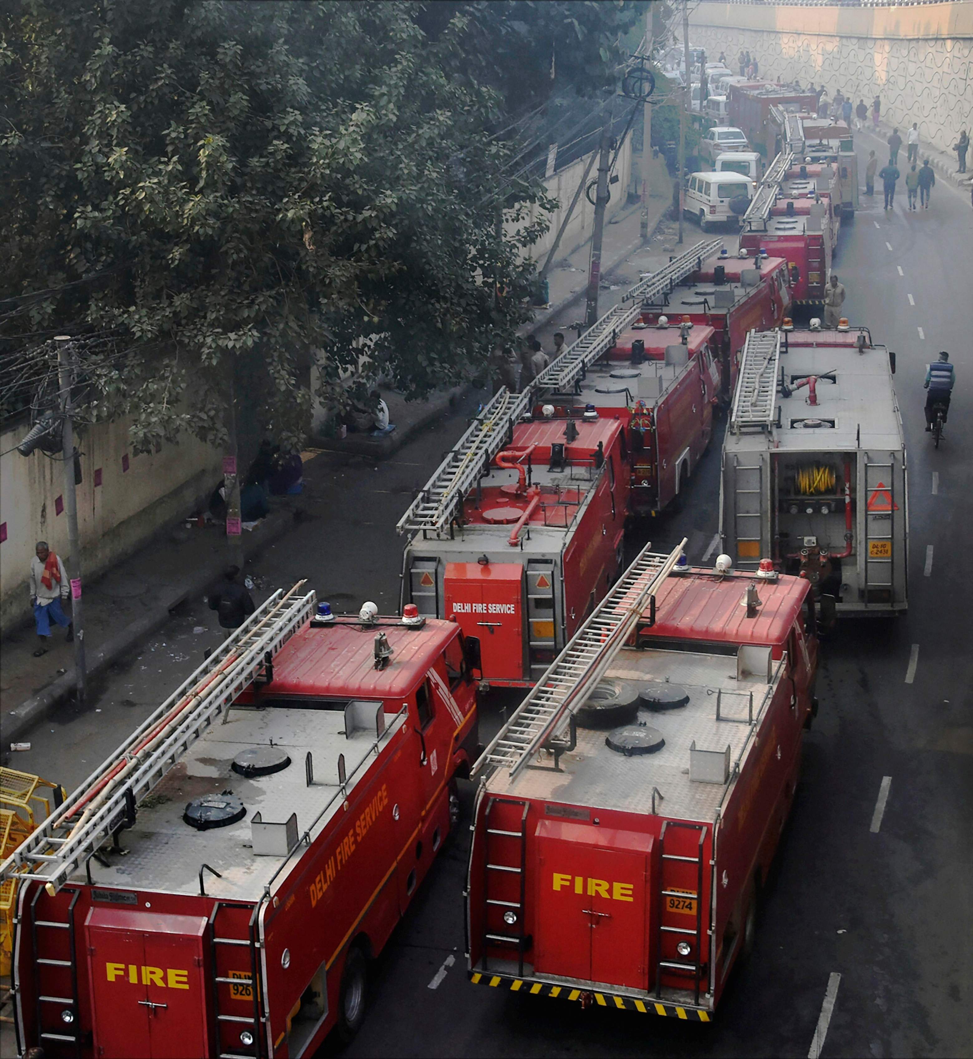 New Delhi: Fire tenders on their way to a factory at Rani Jhansi Road, where a major fire broke out, in New Delhi, Sunday morning, Dec. 8, 2019. Atleast 35 people were killed and several others injured in the mishap. (PTI Photo) (PTI12_8_2019_000011B)