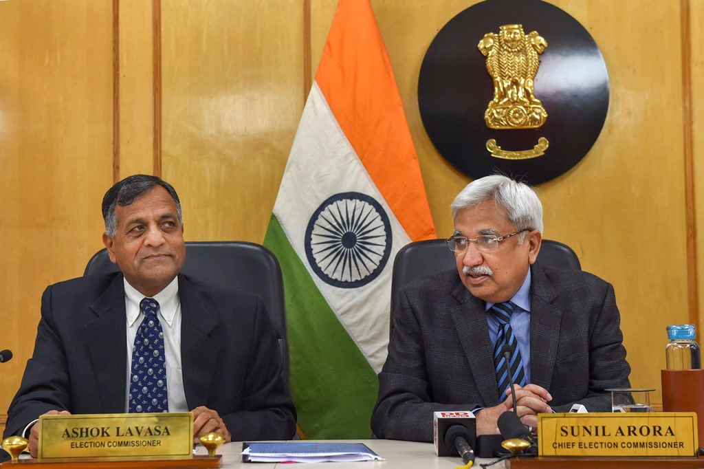 New Delhi: Chief Election Commissioner Sunil Arora along with Election Commissioner Ashok Lavasa (L) addresses a press conference to announce the poll schedule for the forthcoming Delhi Assembly elections, in New Delhi, Monday, Jan. 6, 2020. (PTI Photo/Subhav Shukla)  (PTI1_6_2020_000082B)