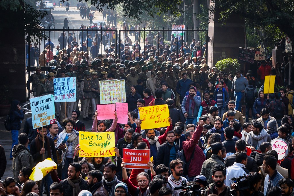 New Delhi: JNU students gather at the entrance gate of the Jawahar Lal University before leaving for their protest march from Mandi House to HRD Ministry, demanding removal of the university vice-chancellor, in New Delhi, Thursday, Jan. 9, 2020. (PTI Photo) (PTI1_9_2020_000199B)
