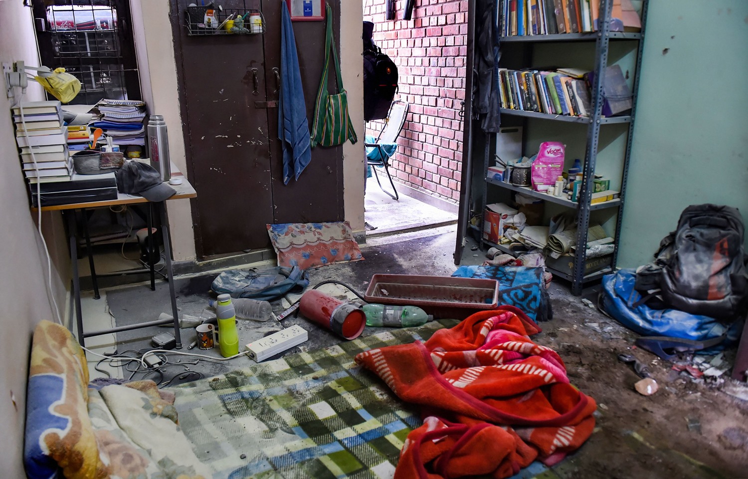 New Delhi: Articles scattered in a room of the Sabarmati Hostel following Sunday's violence at the Jawaharlal Nehru University (JNU) , in New Delhi, Monday, Jan. 6, 2020. A group of masked men and women armed with sticks, rods and acid allegedly unleashed violence on the campus of the University, Sunday evening. (PTI Photo/Atul Yadav) (PTI1_6_2020_000073B)
