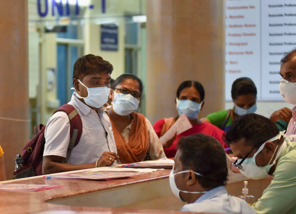 Hyderabad: Visitors wear protective masks in wake of the deadly novel coronavirus, at Government Gandhi Hospital in Hyderabad, Tuesday, March 3, 2020. Two people have tested positive for the coronavirus in India – one in Telangana and another in New Delhi – the Ministry of Health confirmed on Monday. (PTI Photo)(PTI03-03-2020_000168B)