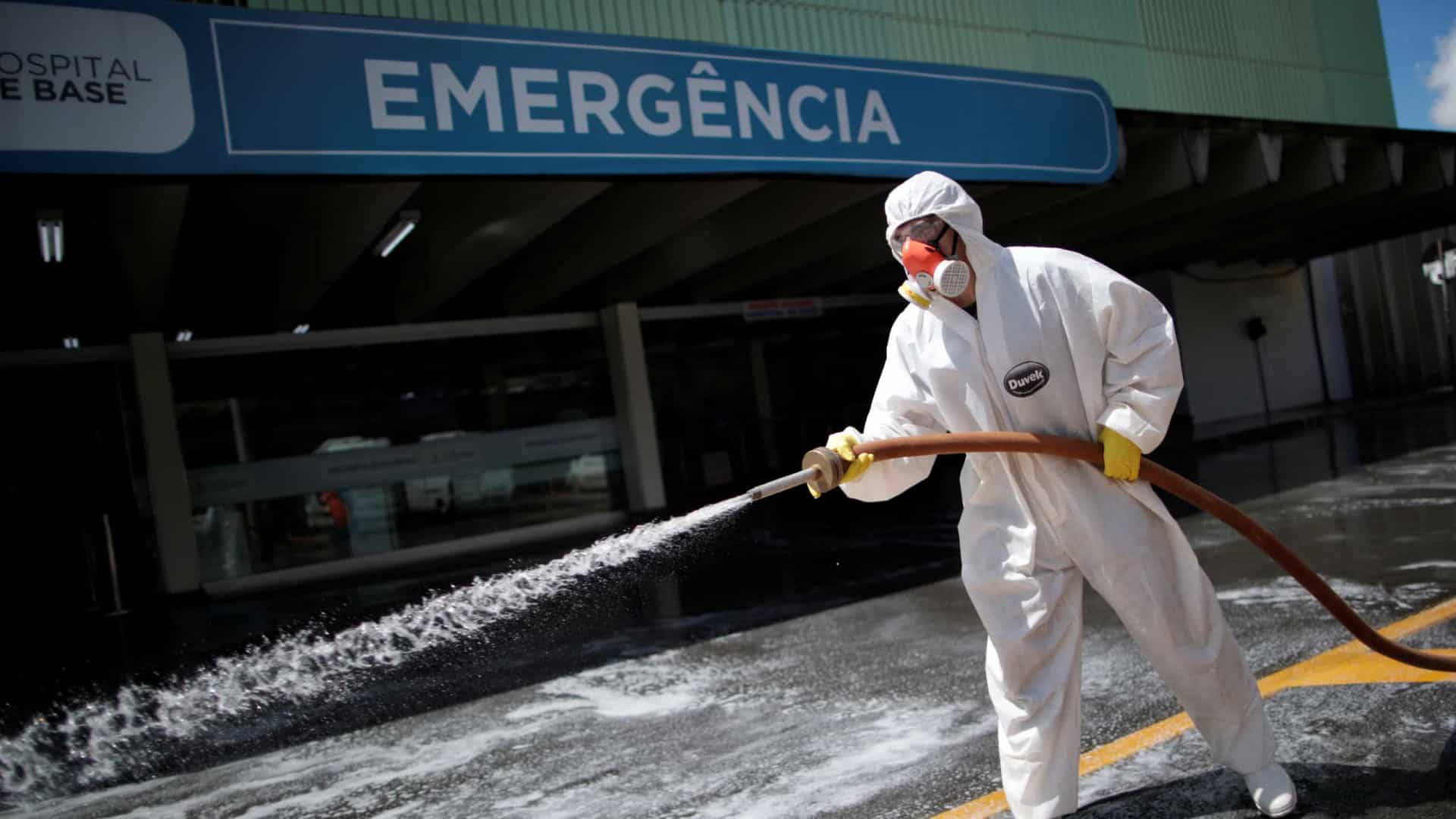 A member of the armed forces disinfects the entrance of a hospital during the coronavirus disease (COVID-19) outbreak in Brasilia, Brazil, March 31, 2020. (Photo: Ueslei Marcelino/Reuters)