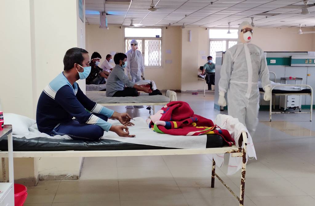 New Delhi: Medics organize special yoga classes for COVID-19 patients at a hospital, during the ongoing nationwide lockdown, in New Delhi, Saturday, May 09, 2020. (PTI Photo)(PTI09-05-2020 000040B)