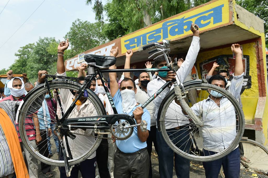 Ghaziabad: Workers shout slogans during a protest outside the factory after the manufacturers of famous Atlas Cycles shut their operations due to financial constraints on Wednesday, in Ghaziabad, Thursday, June 4, 2020. The company was facing financial crisis from the past many years even after the closure of its Malanpur unit but with the shutting of the Sahibabad unit, it has closed down its last factory. (PTI Photo/Arun Sharma)(PTI04-06-2020 000064B)