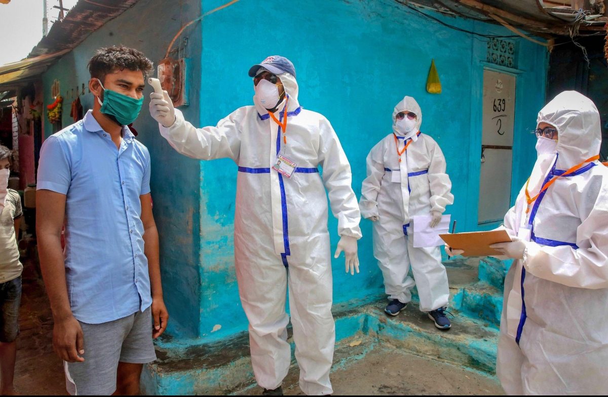 A team of doctors wearing protective suits check slum dwellers during a house-to-house health survey at Vallabh Nagar during the nationwide lockdown imposed in wake of the coronavirus pandemic in Bhopal Monday April 20 2020. (Photo | PTI)