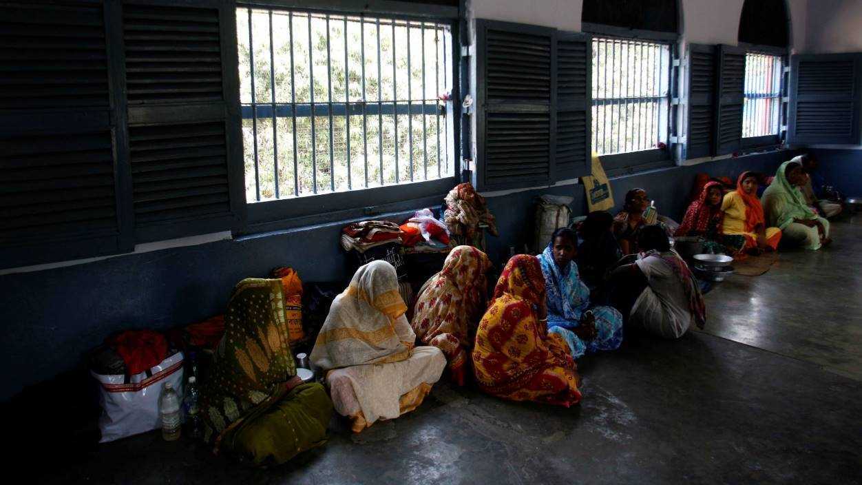 Female prisoners sit inside their cell in the eastern Indian city of Kolkata. Credit: Reuters