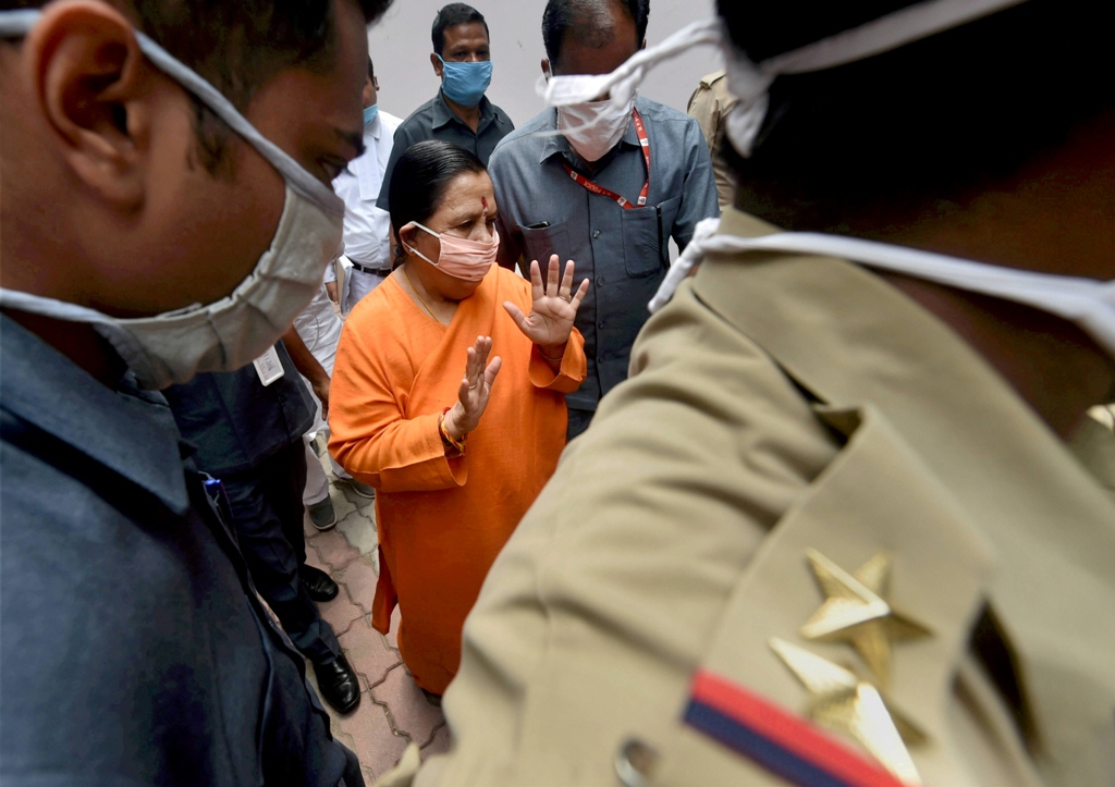Lucknow: Senior BJP leader Uma Bharti arrives at a special CBI court for a hearing in Babri mosque demolition case, in Lucknow, Thursday, July 2, 2020. (PTI Photo/Nand Kumar) (PTI02-07-2020 000109B)