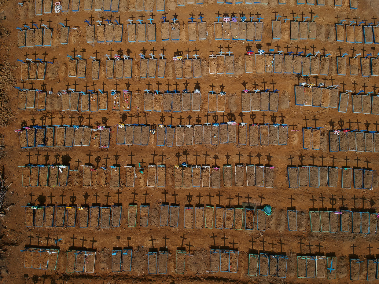 An aerial view of crosses casting shadows at the Parque Taruma cemetery in Manaus, Brazil, June 15, 2020. Brazil, the world's No. 2 coronavirus hot spot after the United States, officially passed 50,000 coronavirus deaths on Sunday, a blow for a country already grappling with more than 1 million cases. REUTERS/Bruno Kelly  