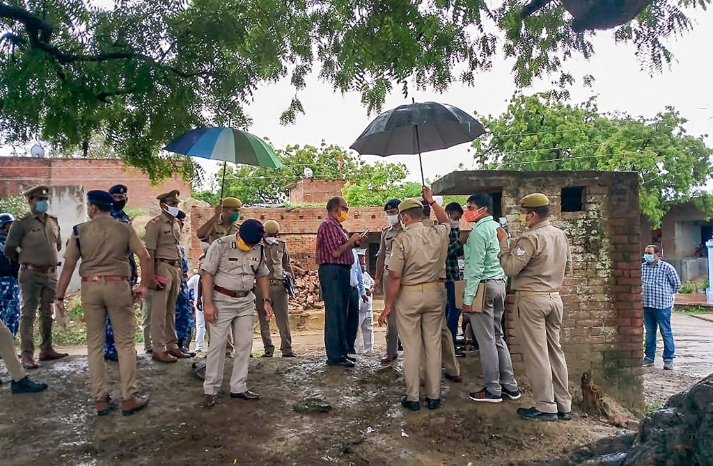Kanpur: A special investigation team visits the Bikaru Village, where eight policemen were killed by gangster Vikas Dubey on July 3, for investigation into the case in Kanpur, Sunday, July 12, 2020. Dubey was also killed in an encounter on July 10. (PTI Photo)
