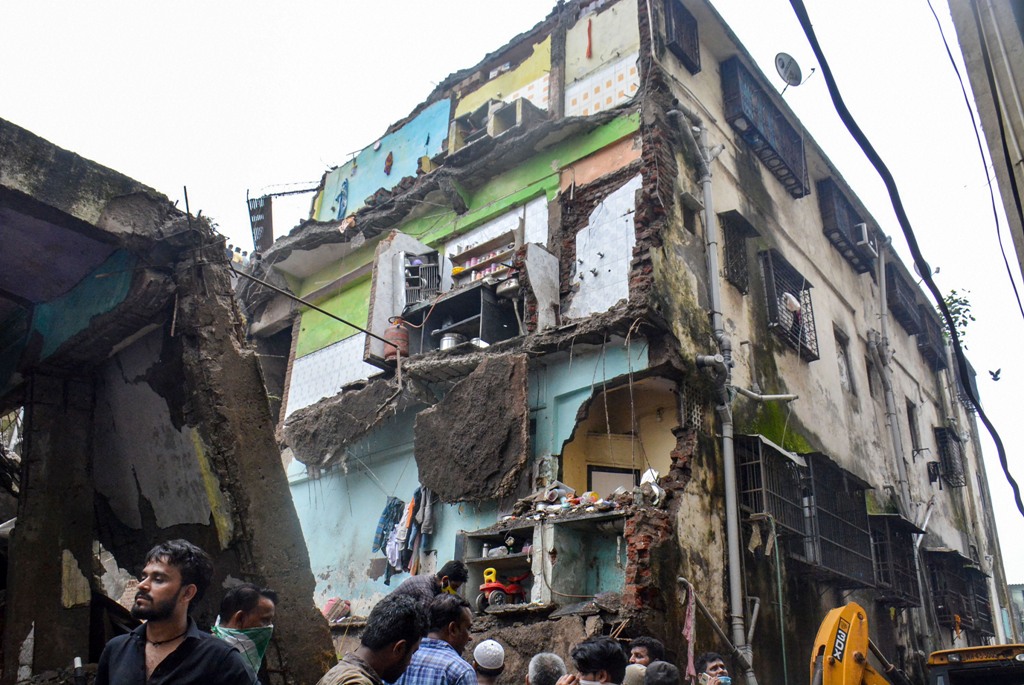 Thane: Rescue operation underway after a three-storeyed building collapsed, at Bhiwandi in Thane district, Monday, Sept. 21, 2020. Seven children and three others were killed and 11, including a four-year-old boy, rescued. (PTI Photo)(PTI21-09-2020 000030B)