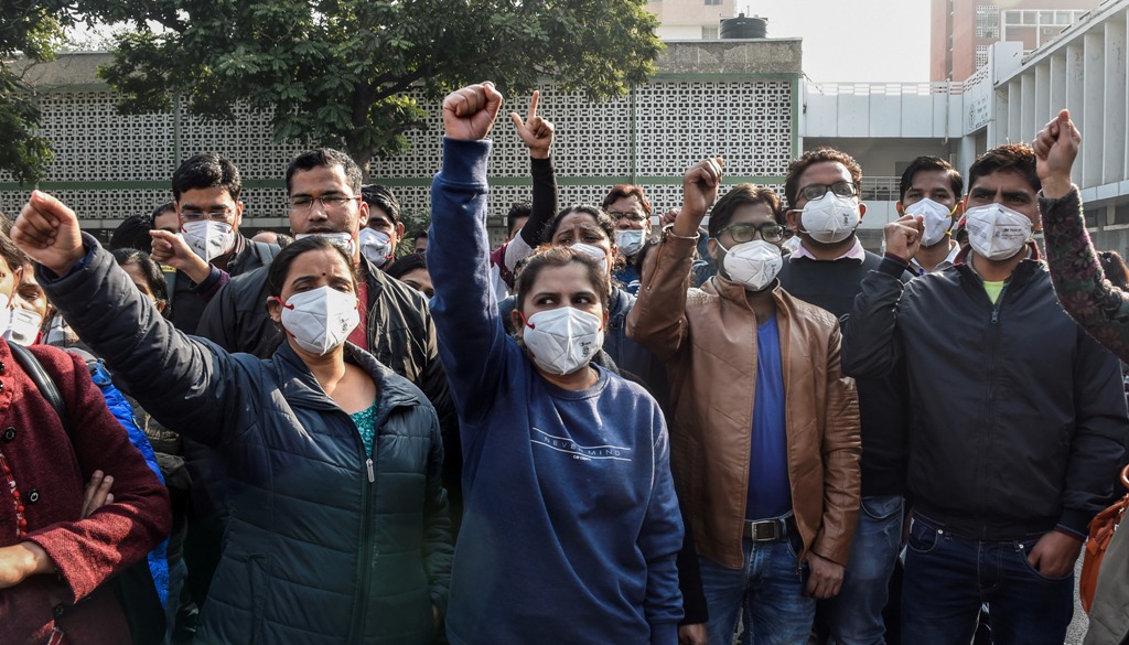 New Delhi: Members of AIIMS Nurses Union raise slogans during their indefinite strike over their long-pending demands, including those concerning the Sixth Central Pay Commission and against contractual appointments, in New Delhi, Tuesday, Dec. 15, 2020. (PTI Photo/Atul Yadav)(PTI15-12-2020 000097B)