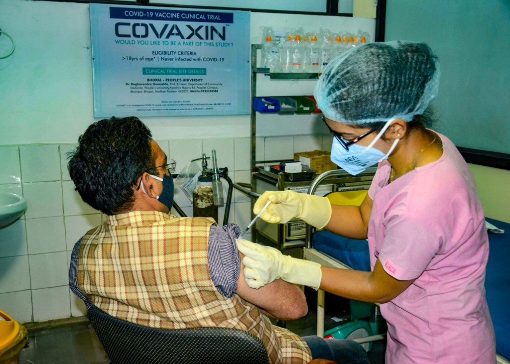 Bhopal: A medic administers Covaxin, developed by Bharat Biotech in collaboration with the Indian Council of Medical Research (ICMR), during the Phase- 3 trials at the Peoples Medical College in Bhopal, Monday, Dec. 7, 2020. (PTI Photo)(PTI07-12-2020 000173B)