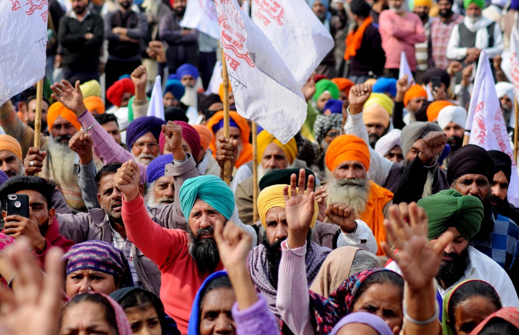 Amritsar: Farmers raise slogans during a protest in support of the nationwide strike, called by farmer unions to press for repeal of the Centres Agri laws, in Amritsar, Tuesday, Dec. 8, 2020. (PTI Photo)(PTI08-12-2020 000197B)
