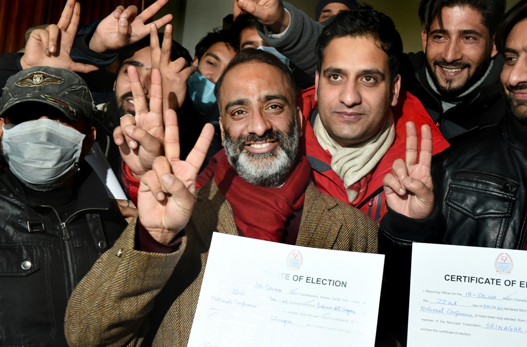 Srinagar: National Conference (NC) candidate Salmaan Sagar flashes victory sign after his lead in the municipality election results, in Srinagar, Tuesday, Dec. 22, 2020. (PTI Photo/S. Irfan)(PTI22-12-2020 000123B)