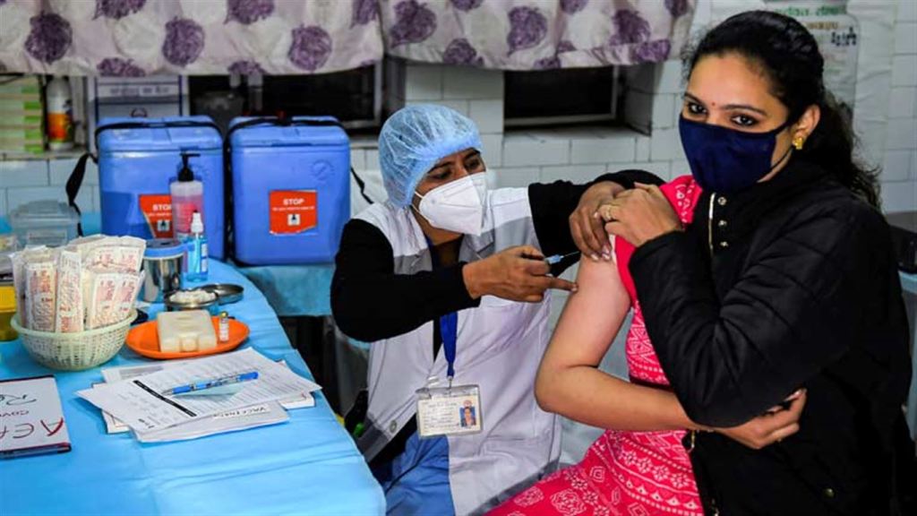 A health worker conducts the dry run of COVID-19 vaccination at a healthcare center in Daryaganj, New Delhi | PTI
